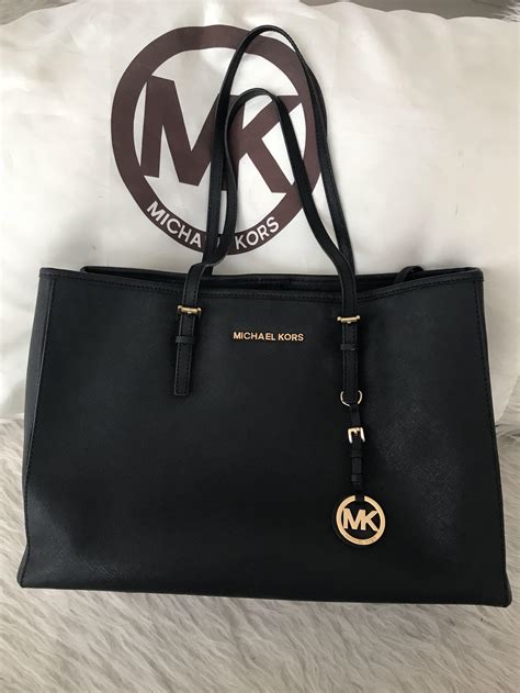 michael kors tas letter er af gevallen|michael kors bag warranty.